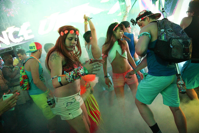 Attendees dance as Tommie Sunshine performs at Stage 7 at the Electric Daisy Carnival at the Las Vegas Motor Speedway in Las Vegas on Friday, June 20, 2014. (Chase Stevens/Las Vegas Review-Journal)