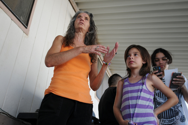 The family of Joseph Wilcox, who was killed attempting to stop Jerad and Amanda Miller Sunday at Walmart, from left, his mother Deborah Wilcox, his niece Hannah Carson, 8, and sister C.J. Foster, ...