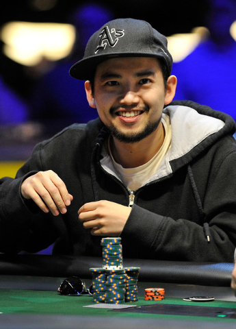 Andrew Tseng, of Edinburgh, UK, smiles after winning a hand during the final table of the Millionaire Maker event at the World Series of Poker tournament at the Rio hotel-casino on Tuesday, June 3 ...