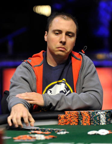 Jonathan Dimmig, of Amherst, N.Y., folds his cards during the final table of the Millionaire Maker event at the World Series of Poker tournament at the Rio hotel-casino on Tuesday, June 3, 2014. ( ...