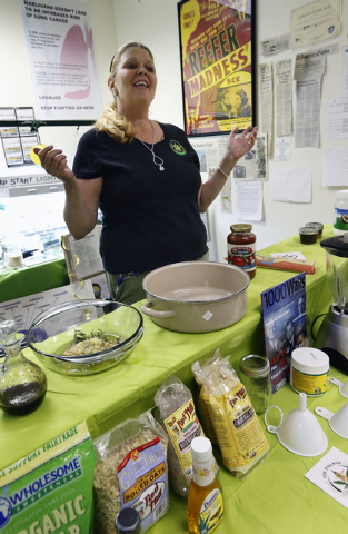 Melissa Fitzgerald discusses how to prepare a cannabis-infused dipping sauce at the New England Grass Roots Institute in Quincy, Mass., on July 10, 2014. Some pot users turn to edibles because the ...