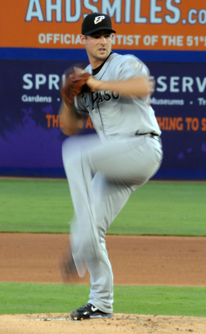 Former Bishop Gorman and College of Southern Nevada ace Donn Roach pitches for the El Paso Chihuahuas against the Las Vegas 51s at Cashman Field, Thursday, July 30, 2014, (Jerry Henkel/Las Vegas R ...