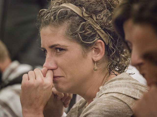 Karina Taylor, ex-girlfriend Kevin Cooney, listens while Linda Cooney speaks at Regional Justice Center on  Wednesday, July 9, 2014. Linda Cooney was sentenced to 13 to 41 years in prison for shoo ...
