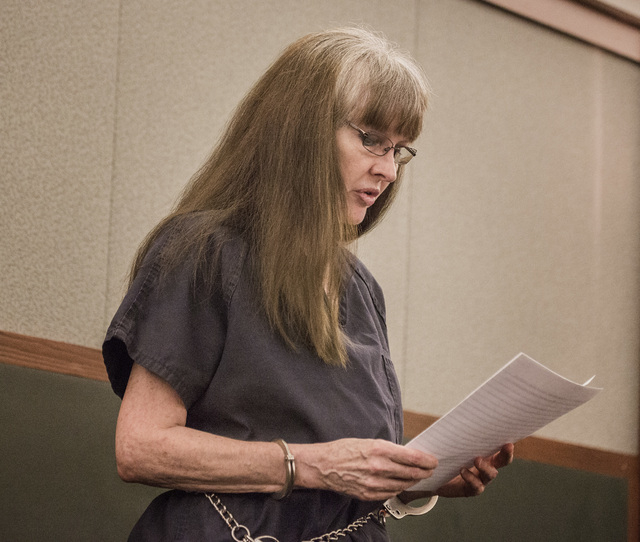 Linda Cooney reads a statement during sentencing at Regional Justice Center on  Wednesday, July 9, 2014. She was  sentenced to 13 to 41 years in prison for shooting and paralyzingly her son Kevin  ...