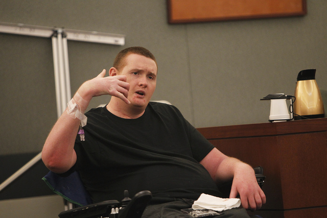 Kevin Cooney testifies as to where he thought the gun was when he was shot in the neck during the attempted murder trial of his mother, Linda Cooney, at the Regional Justice Center in Las Vegas on ...