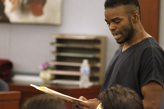 Jason Griffith reads a letter to the court during his sentencing hearing at the Regional Justice Center in Las Vegas Wednesday, July 23, 2014. Griffith was sentenced 10 years to life in prison for ...