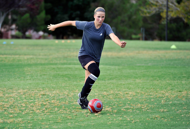Avery Jacobsen, 15, kicks the ball during her club soccer practice at Crossing Park on Monday, July 7, 2014. Jacobsen is returning to the soccer field after suffering a knee injury. (David Becker/ ...