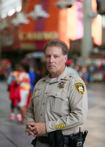 Metro Police Capt. Shawn Andersen, (cq) of Downtown Area Command that polices Fremont Street Experience, stands under the canopy at Fremont Street Experience Thursday, July 17, 2014, in Las Vegas. ...