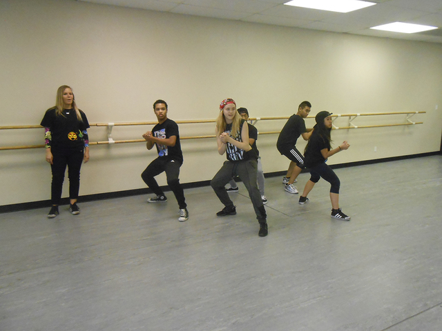 uanset Sindsro kan ikke se Kay More oversees varsity members of The Prodigy Dance Crew, a hip-hop dance  group, July 9 at the Studio One Summerlin Dance Academy, 1131 S. Buffalo  Drive. The Prodigy is set to