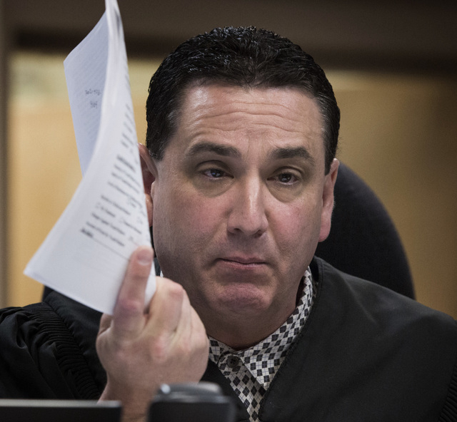 Clark County Family Court Judge William Voy speaks  on Thursday, July 24, 2014 at  Family Courts and Services Center during  a hearing involving juvenile hogtying incidents. Judge Voy  removed Cla ...