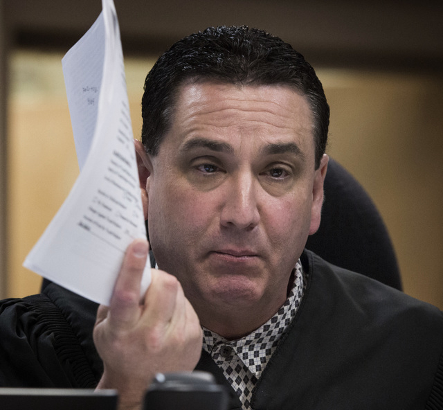 Clark County Family Court Judge William Voy speaks on Thursday, July 24, 2014 at Family Courts and Services Center during a hearing involving juvenile hogtying incidents. Judge Voy removed Cla ...