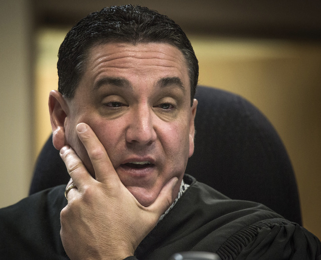 Clark County Family Court Judge William Voy speaks on Thursday, July 24, 2014 at Family Courts and Services Center during a hearing involving juvenile hogtying incidents. Judge Voy removed Cla ...
