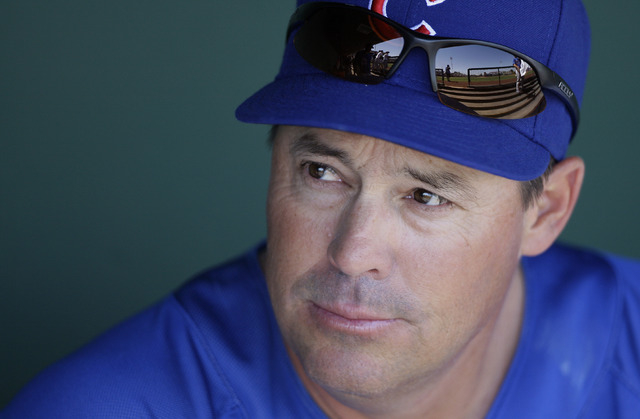 Former Chicago Cubs pitcher Greg Maddux, now assistant to the general manager, before the Cubs played the San Francisco Giants in a spring training baseball game in Scottsdale, Ariz., Tuesday, Mar ...
