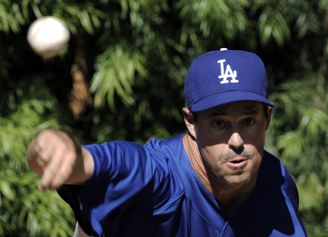 Los Angeles Dodgers pitcher Greg Maddux throws in the bullpen during baseball practice in Los Angeles on Monday, Oct. 6, 2008.  The Dodgers face the Philadelphia Phillies in the best-of-seven Nati ...