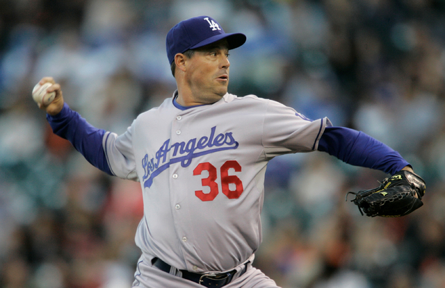 Los Angeles Dodgers' Greg Maddux pitches to the San Francisco Giants in the first inning of a baseball game in San Francisco, Saturday, Sept. 27, 2008. The Dodgers won 2-1. (AP Photo/Jeff Chiu)