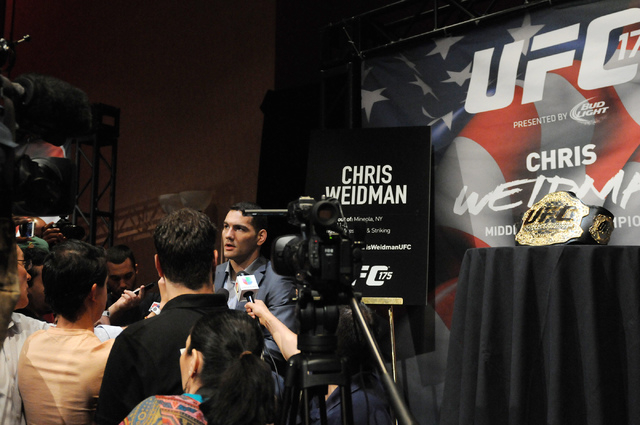 Chris Weidman, Ultimate Fighting Championship middleweight champion, is interviewed during media day at Mandalay Bay Events Center in Las Vegas Thursday, July 3, 2014. Weidman is slated to defend  ...