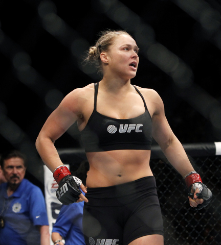 Ronda Rousey reacts after defeating Alexis Davis during UFC 175 at the Mandalay Bay Events Center in Las Vegas on Saturday, July 5, 2014. (Jason Bean/Las Vegas Review-Journal)
