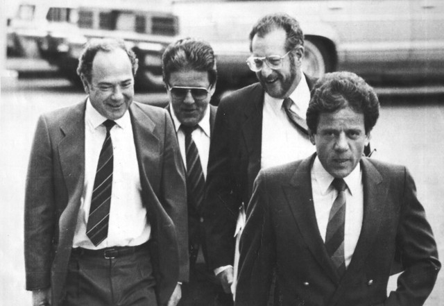 Reputed Las Vegas crime figure Anthony "The Ant" Spilotro, second from left, and his brother Michael, right, walk with their attorneys Jerry Werksman, left, and Oscar Goodman, outside fe ...