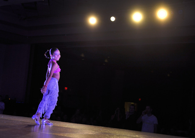 Kailey Rosas, 9, takes a bow after performing during the 11th annual Las Vegas Salsa Congress at the Tropicana Las Vegas hotel-casino on Friday, July 4, 2014. (David Becker/Las Vegas Review-Journal)