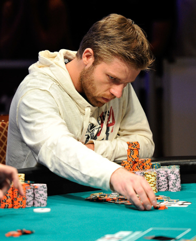Jorryt van Hoof places a bet during day 7 of the World Series of Poker Main Event at the Rio hotel-casino on Monday, July 14, 2014. By the end, van Hoof is the chip leader with 38.375 million. (Da ...