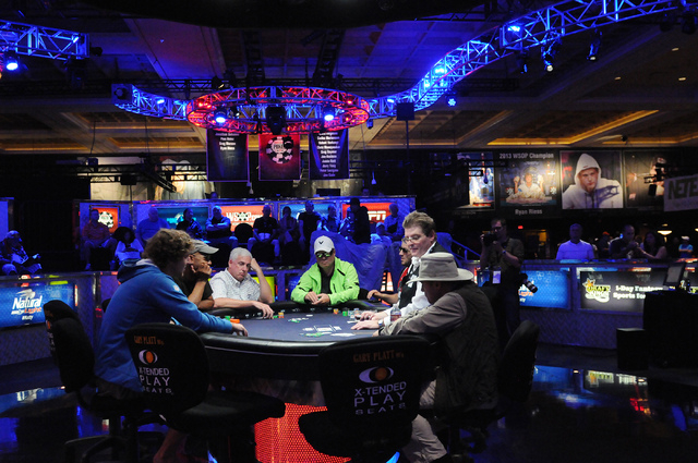 Players compete on the main stage inside the the Amazon room during the 2014 World Series of Poker event at the Rio Convention Center in Las Vegas Saturday, July 5, 2014. (Erik Verduzco/Las Vegas  ...