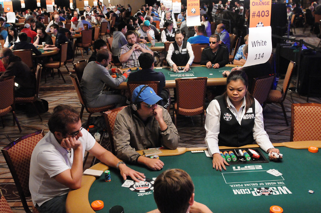 Players compete during the 2014 World Series of Poker event at the Rio Convention Center in Las Vegas Saturday, July 5, 2014. (Erik Verduzco/Las Vegas Review-Journal)