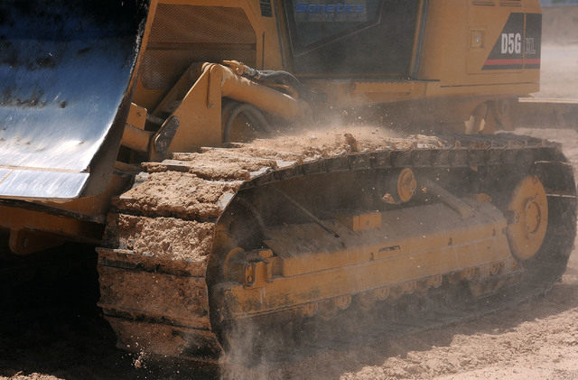 A bulldozer driven by Dianne Deegan churns up dirt at Dig This. (Jerry Henkel/View)