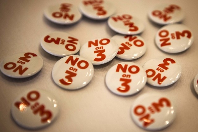 Buttons against the proposed margins tax on display during a luncheon on the proposed margin tax at the Four Seasons on Wednesday, June 18, 2014. Around 250 people attended the Metro Las Vegas Cha ...