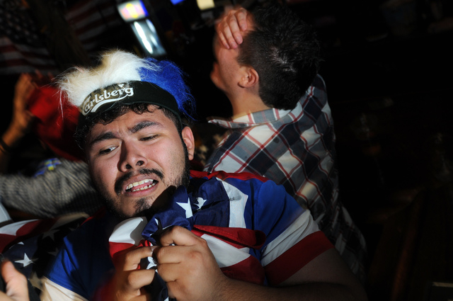 Jose Perez reacts to a goal by Belgium against the United States during a viewing party of the 2014 FIFA World Cup quarter-final soccer game at Crown & Anchor British Pub in Las Vegas Tuesday, Jul ...