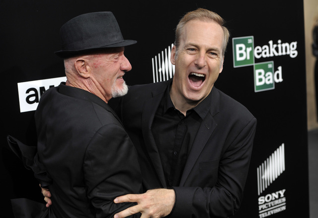 This July 24, 2013 file photo shows former cast member Jonathan Banks, left, and current cast member Bob Odenkirk, from "Breaking Bad," on the red carpet at a premiere screening to celebrate the f ...