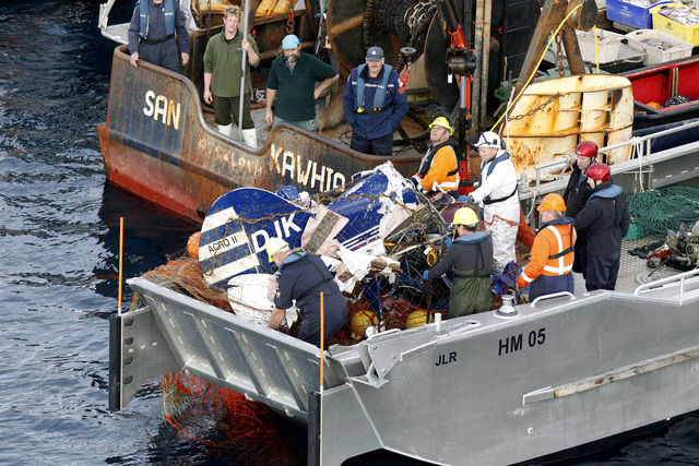 Fisherman pulls in plane, finds dead body inside Las ...
