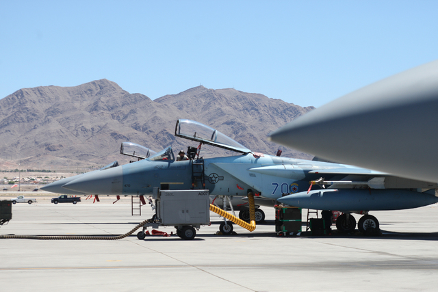 F-15 aircraft undergoing routine maintenance at Nellis AFB are part of the 65th Aggressor Squadron which will be deactivated in September 2014. Wednesday, August 7, 2014 (Michael Quine/Las Vegas R ...