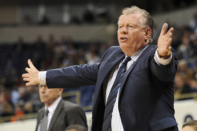 Former Loyola Marymount head coach Max Good gestures to his team during the first half of an NCAA college basketball game against Pittsburgh on Friday, Dec. 6, 2013, in Pittsburgh. (AP Photo/Don W ...