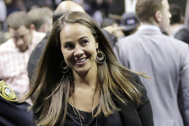 In this April 30, 2014, file photo, San Antonio Stars' Becky Hammon walks off the court following Game 5 of the opening-round NBA basketball playoff series between the San Antonio Spurs and the Da ...