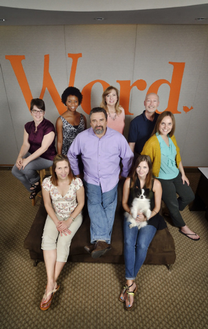 Alex Raffi, senior partner and creative director at iMAGiNE Communications, seated center, is shown with his team at the firm's offices at 11500 S. Eastern Ave. in Henderson on Friday, Aug. 15, 20 ...