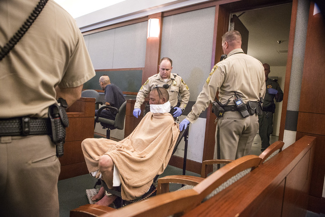 Scott Carmitchel makes his first appearance in  Regional Justice Center on Wednesday, July 30, 2014. Carmitchel was  is facing charges of battery, grand larceny, burglary and robbery with a deadly ...