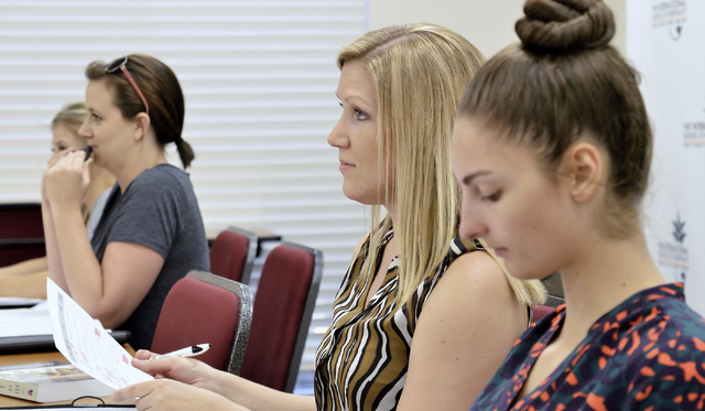 Megan Kinkade, second from right, listens during a human resources class at The International School of Hospitality at 3614 E. Sunset Road in Las Vegas on Monday, July 21, 2014. Kinkade, who was a ...
