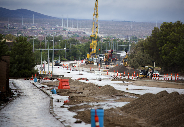 The flooded Grand Teton Drive near North Tenaya Way in northwest Las Vegas as seen Monday, Aug. 4, 2014. Overnight monsoon rains caused flooding in the area.
(Jeff Scheid/Las Vegas Review-Journal)