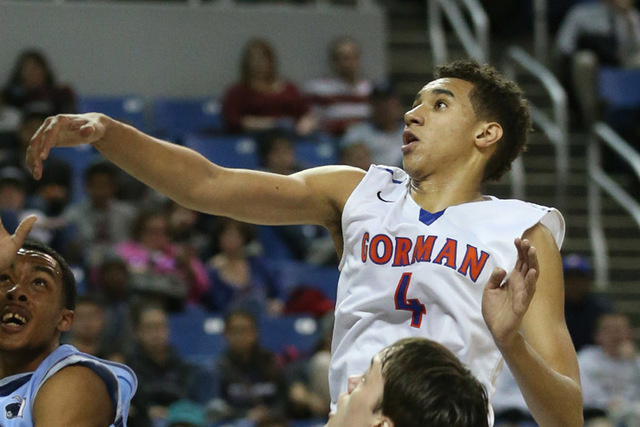 Bishop Gorman's Chase Jeter goes for a block against Canyon Springs. Jeter verbally committed to Duke on Monday. (Cathleen Allison/Las Vegas Review-Journal file)
