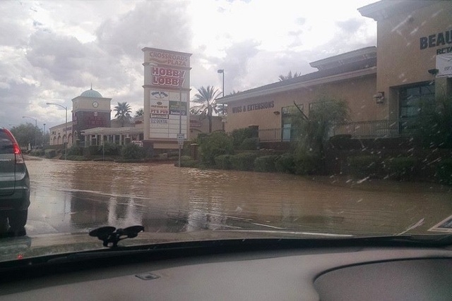 Flooding at the intersection or Tropicana and Fort Apache roads. (Courtesy, Paul Jang/Facebook)