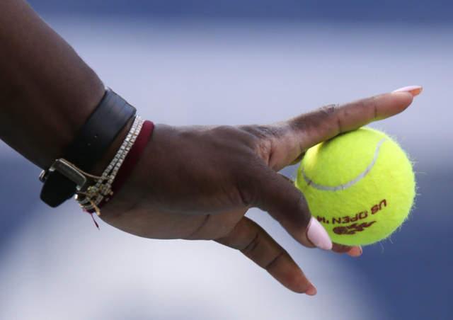 Serena Williams prepares to serve against Caroline Wozniacki, of Denmark, during the championship match of the 2014 U.S. Open tennis tournament, Sunday, Sept. 7, 2014, in New York. (AP Photo/Charl ...