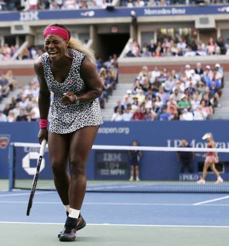 Serena Williams, reacts after a shot against Caroline Wozniacki, of Denmark, during the championship match of the 2014 U.S. Open tennis tournament, Sunday, Sept. 7, 2014, in New York. (AP Photo/Ch ...