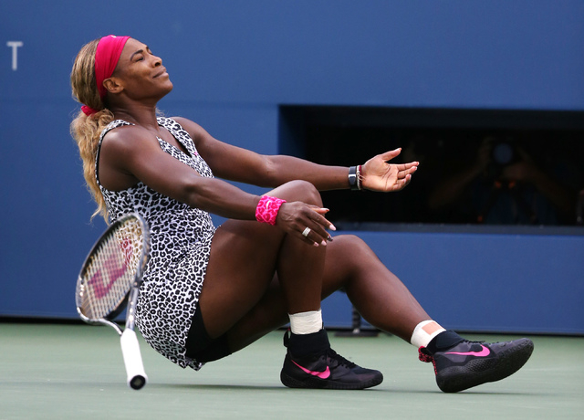Serena Williams, reacts after defeating Caroline Wozniacki, of Denmark, during the championship match of the 2014 U.S. Open tennis tournament, Sunday, Sept. 7, 2014, in New York. (AP Photo/Mike Groll)