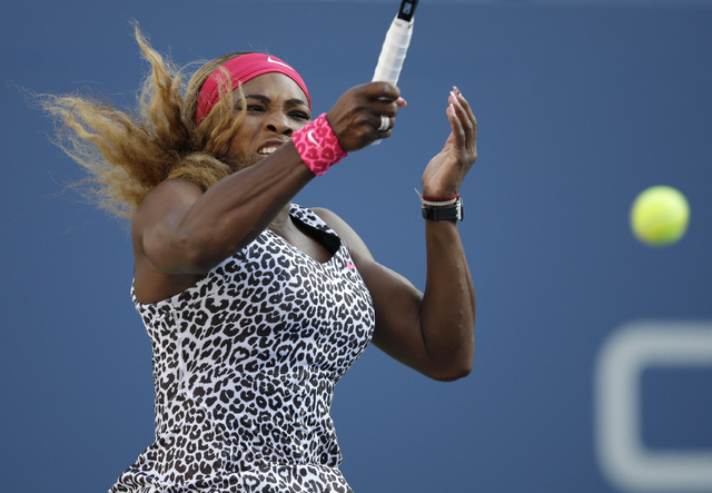 Serena Williams, returns a shot against Caroline Wozniacki, of Denmark, during the championship match of the 2014 U.S. Open tennis tournament, Sunday, Sept. 7, 2014, in New York. (AP Photo/Darron  ...
