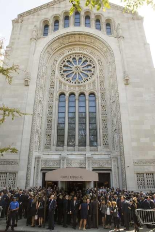 Mourners depart the funeral of comedian Joan Rivers at Temple Emanu-El in New York September 7, 2014. REUTERS/Lucas Jackson (UNITED STATES - Tags: ENTERTAINMENT OBITUARY)