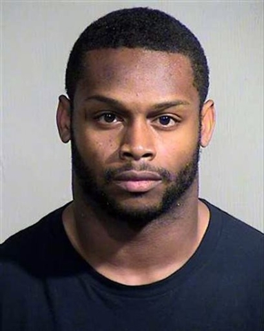 This Sept. 17, 2014 booking photo provided by the Maricopa County, Ariz., Sheriff's Office shows Arizona Cardinals running back Jonathan Dwyer. Arizona Cardinals running back Jonathan Dwyer was ar ...