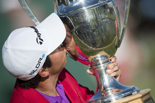 Winner David Lipsky of the USA kiss the trophy after the final round of the Omega European Masters Golf Tournament in Crans-Montana, Switzerland, Sunday, Sept. 7, 2014. (AP Photo/Keystone,Ennio Le ...