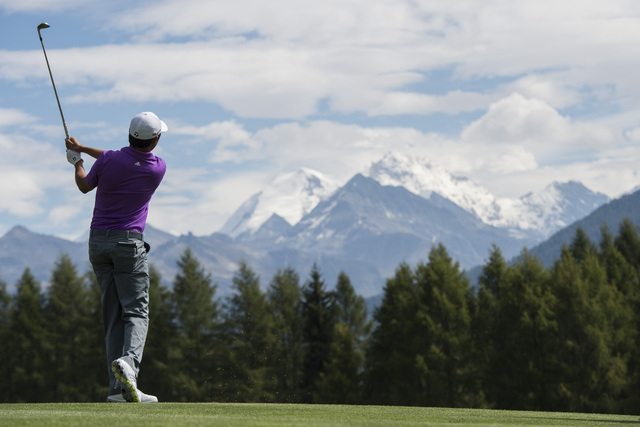 Winner David Lipsky of the USA tees of  at hole 12 during the final round of the Omega European Masters Golf Tournament in Crans-Montana, Switzerland, Sunday, Sept. 7, 2014. (AP Photo/Keystone, En ...