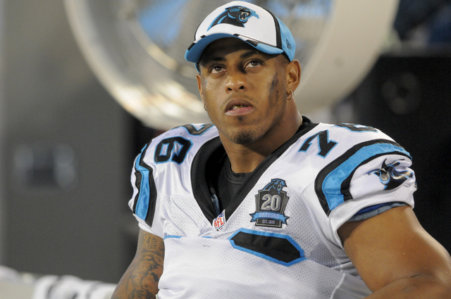 Carolina Panthers defensive end Greg Hardy (76) looks on from the sideline during a preseason NFL football game Friday, Aug. 8, 2014, in Charlotte, N.C. (AP Photo/Mike McCarn)