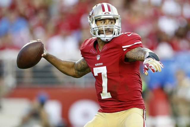 San Francisco 49ers quarterback Colin Kaepernick (7) passes against the Chicago Bears during an NFL football game in Santa Clara, Calif., Sunday, Sept. 14, 2014. (AP Photo/Tony Avelar)